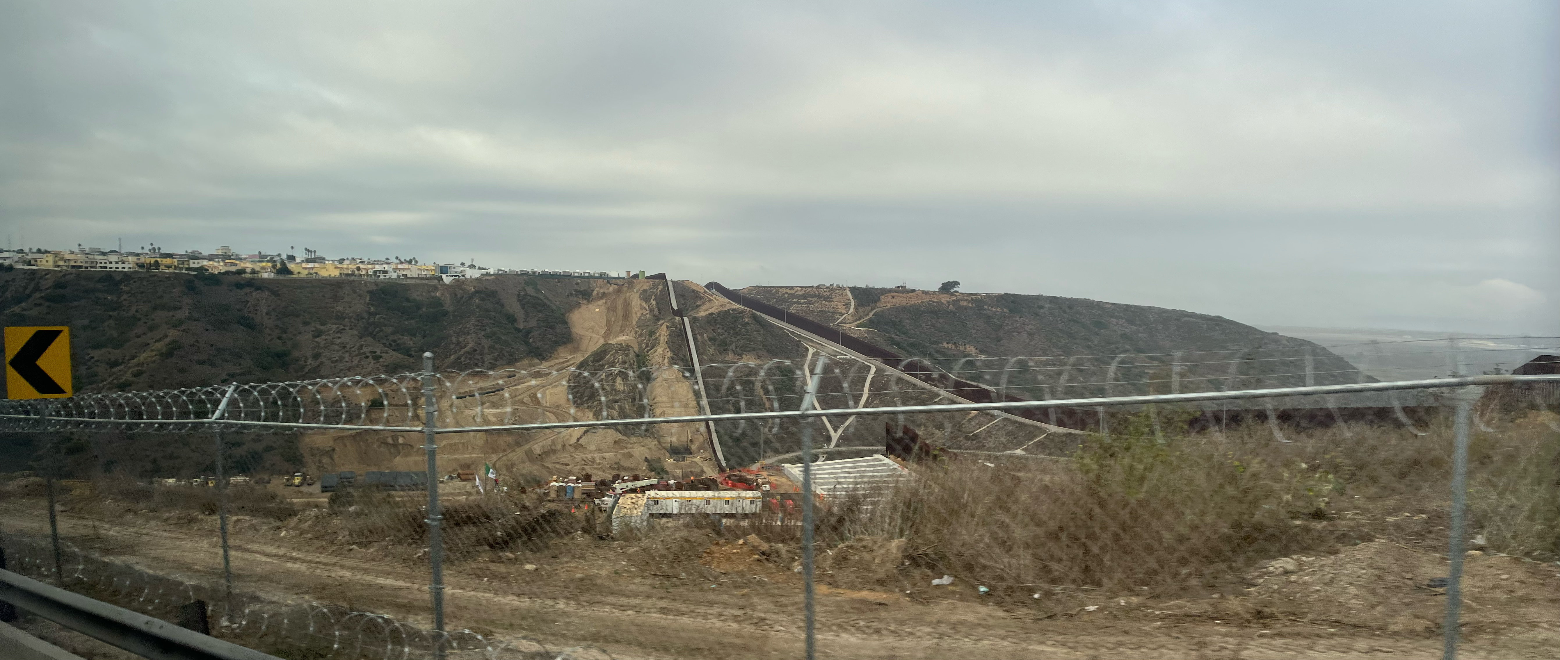 A view of the border fence and razor wire